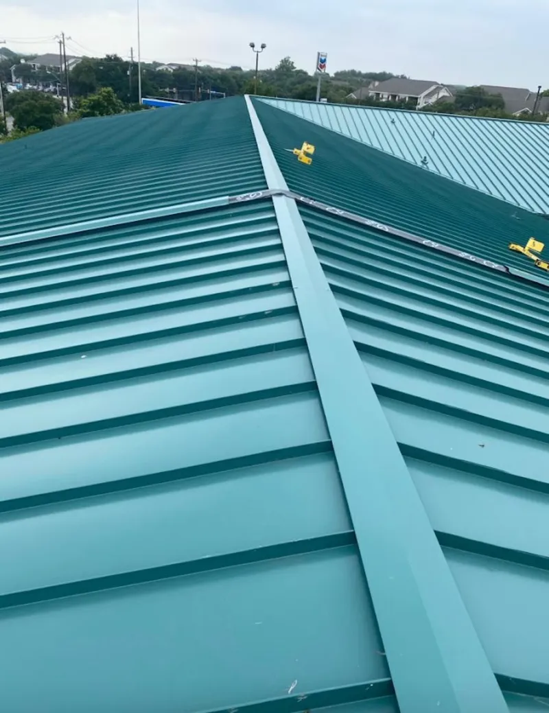 Green commercial metal roof ridge and valley for Metal Roof Repair in Francisville
